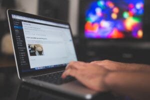 Person typing on a laptop